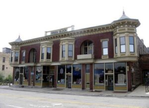 The historic facade of the Ellwood’s Green Block Lager & Ale Room